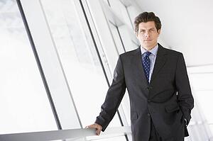 Businessman standing in corridor