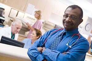 Doctors And Nurses At The Reception Area Of A Hospital