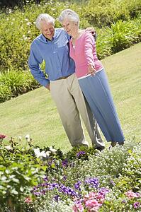 Senior couple in a flower garden