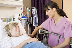 Nurse Talking To Senior Woman