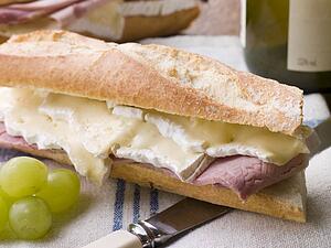 Brie and Ham Baguette with White Wine and Grapes