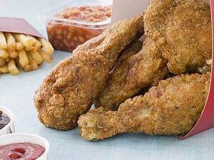 Southern Fried Chicken In A Box With Fries, Baked Beans, Coleslaw And Sauces