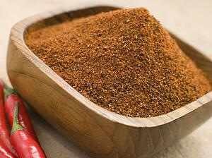 Dish of Hot Chili Powder with Fresh Chilies
