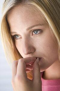 Head shot of worried woman