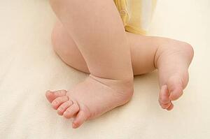Baby lying indoors