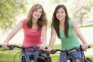 Teenage Girls On Bicycles