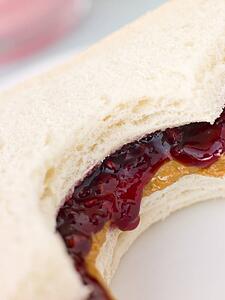 Peanut Butter And Raspberry Jelly Sandwich On White Bread