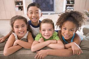 Four Young Friends Hanging Out At Home
