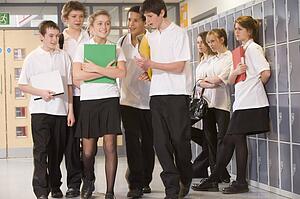 Secondary school students in a school hallway