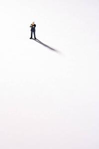 Figurine Of Businessman With Arms Crossed