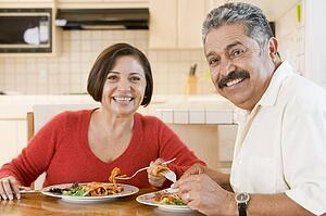 Elderly Couple Enjoying meal, mealtime Together