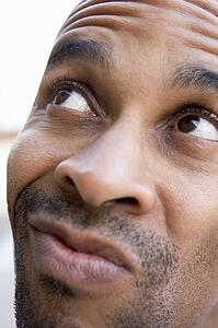 Head shot of man thinking