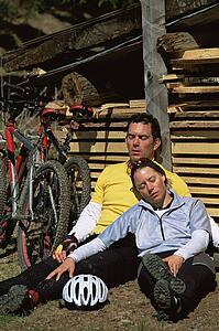 Cyclists resting after cycle ride