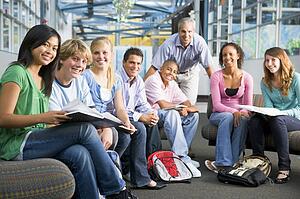 Students study group with teacher
