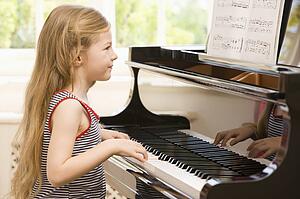 Young Girl Playing Piano