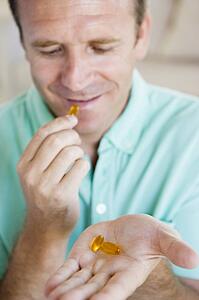 Man Taking Pills
