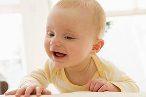 Baby lying indoors