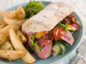 Steak and Roasted Pepper Ciabatta Sandwich with Spiced Potato Wedges