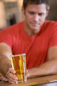 Man having a glass of beer