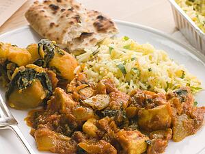 Chicken Bhoona, Sag Aloo, Pilau Rice And Naan Bread