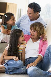Grandparents talking with grandchildren.