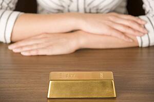 Gold Bar On Desk 