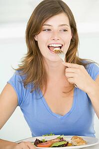 Young Woman Enjoying meal, mealtime