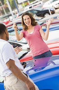 Woman shopping for a new car