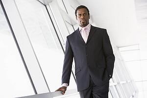 Businessman standing in corridor