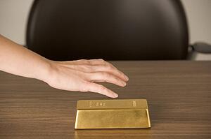 Gold Bar On Desk 