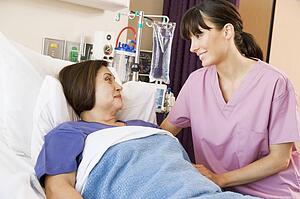 Nurse Talking To Patient