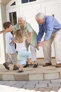 Grandparents welcoming grandchildren.