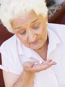 Woman Taking Pills