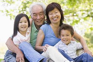 Grandparents laughing with grandchildren.