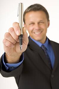 Businessman Holding A Pen