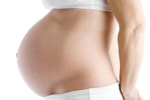 Pregnant woman's exposed belly