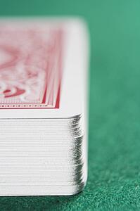Deck of cards on a poker table (close up/selective focus)