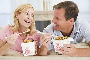Couple Eating Takeaway meal, mealtime Together