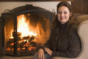 Woman in living room smiling