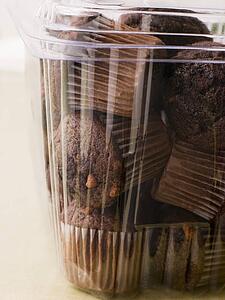 Double Chocolate Chip Muffins In A Plastic Box