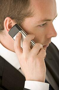 Businessman Talking On Mobile Phone 