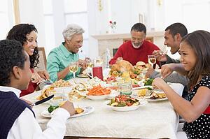 Family All Together At Christmas Dinner