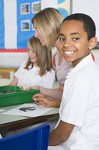 Students in art class with teacher (selective focus)
