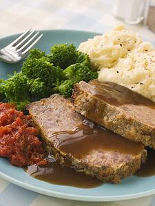 Mama's Meatloaf with Mashed Potato Broccoli Tomatoes and Gravy