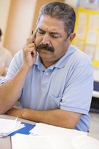 Adult student in class thinking