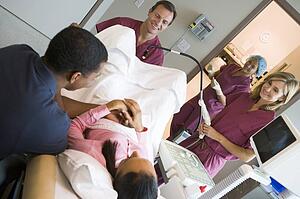 Doctor retrieving eggs from ovary using vaginal ultrasound