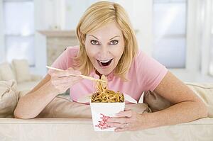 Woman Eating meal, mealtime With Chopsticks 