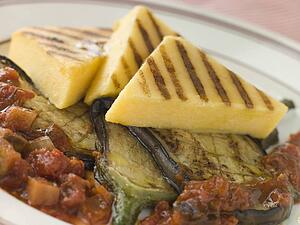 Chargrilled Polenta Cakes with Fried Egg Plant Tomato and Egg Plant Sauce