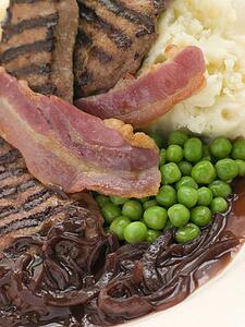 Grilled Calves Liver and Bacon with Mashed Potato and Peas