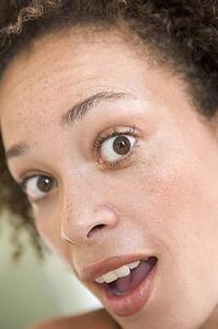 Head shot of surprised woman